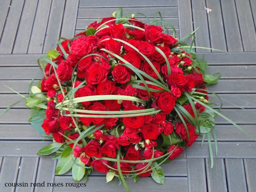 Coussin rond de roses rouge